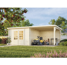 Abri de jardin en bois avec double porte et tracteur de pelouse dans le jardin