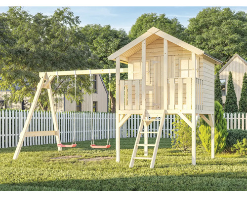 Maison de jeux en bois avec balançoire dans le jardin