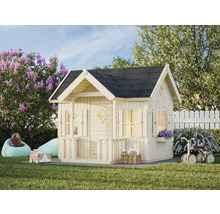 Maisonnette en bois avec toit foncé dans un jardin