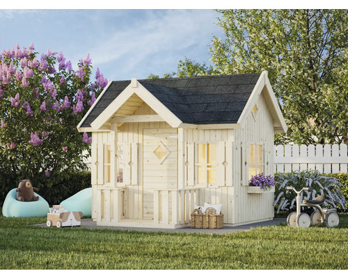 Maisonnette en bois avec toit foncé dans un jardin