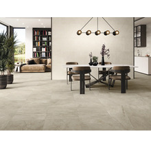 Salon lumineux avec table à manger et carrelage.