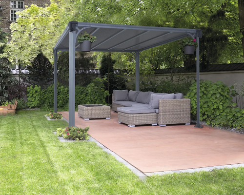 Jardin avec pavillon de jardin, mobilier de salon et dalles de terrasse