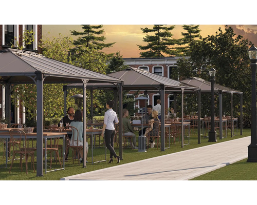 Pavillon Martinique 5000 Mehrere Pavillons mit Tischen und Stühlen auf einer Rasenfläche für den Aussenbereich.