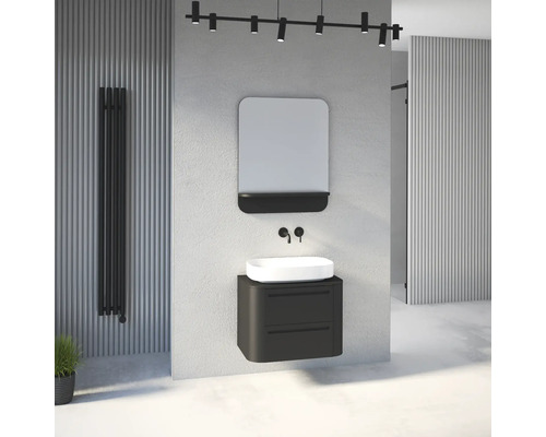 Salle de bains moderne et lumineuse avec meuble sous-vasque sombre, vasque à poser blanche, robinetterie noire, miroir avec tablette et radiateur.