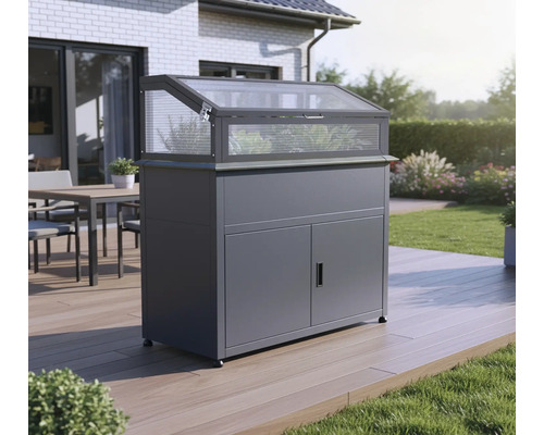 Jardinière surélevée avec armoire et serre châssis dans le jardin.