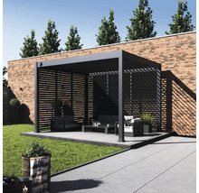 Salon de jardin moderne avec pergola et meubles de salon sur terrasse avec pelouse