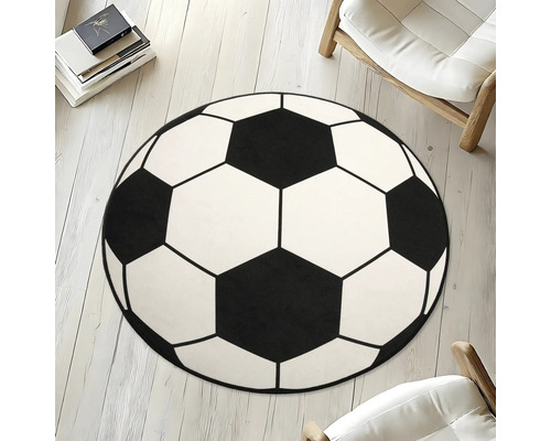 Tapis rond avec motif de ballon de football sur plancher en bois