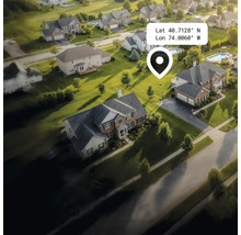 Vue aérienne d'un quartier résidentiel avec maisons, jardins et rues