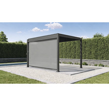 Pergola avec élément latéral comme protection solaire dans le jardin