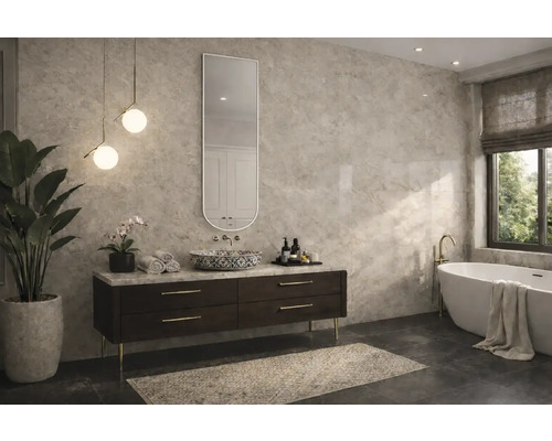 Salle de bain moderne avec meuble sous-vasque sombre, vasque à poser avec motif, baignoire îlot et carrelage mural aspect marbre.