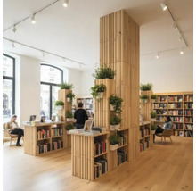 Intérieur d'une librairie avec des étagères, des plantes et un coin lecture.