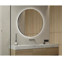 Salle de bain moderne avec miroir rond et lavabo