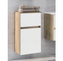 Meuble latéral de salle de bains suspendu, aspect chêne avec deux façades blanches et ouverture sans poignée.