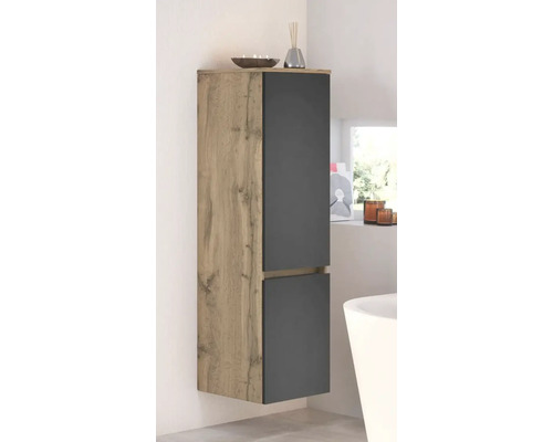 Colonne de salle de bains suspendue en aspect chêne avec deux façades anthracite dans une salle de bains moderne et lumineuse.