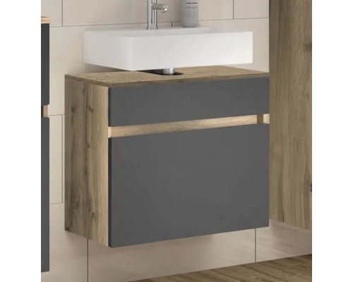 Meuble sous-lavabo suspendu en aspect bois avec façades anthracite et vasque à poser blanche.
