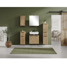 Ensemble de meubles de salle de bain modernes aspect bois à lattes verticales. Comprend un sous-vasque avec lavabo, armoire de toilette et colonnes.