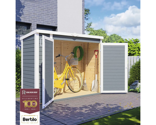 Abri de jardin avec portes ouvertes et outils de jardin