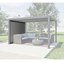 Pergola avec toit à lamelles, canapé d'angle et paroi d'intimité dans le jardin