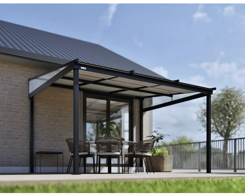 Terrasse avec auvent de terrasse et mobilier de salon