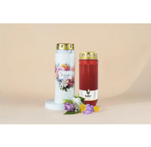 Deux bougies funéraires avec décorations florales