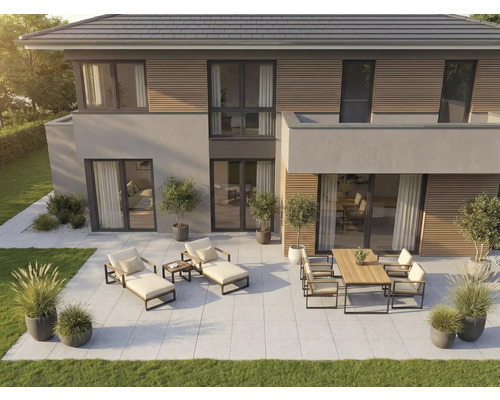 Extérieur d'une maison moderne avec mobilier de terrasse sur carrelage