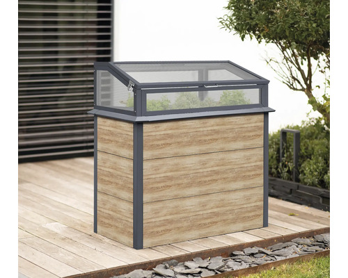 Jardinière surélevée avec serre châssis rabattable sur une terrasse