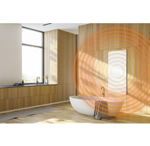 Salle de bains moderne avec baignoire, lavabo et panneau chauffant au mur avec ondes de chaleur.