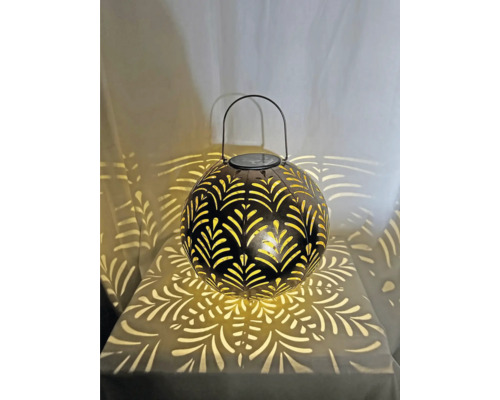 Dekorative Solarleuchte in Kugelform mit Blattmuster und Tragegriff