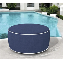Runder Pouf mit weißem Rand neben einem Swimmingpool