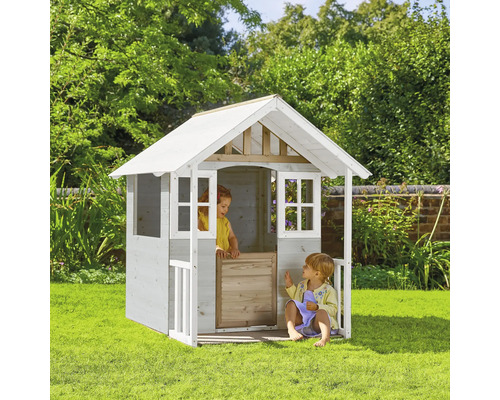 Kinderspielhaus aus Holz mit zwei Kindern im Garten.