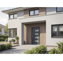 Modernes Haus mit Haustür, Fenstern und Ziegelmauerwerk