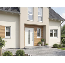 Extérieur d'une maison avec porte d'entrée et fenêtres