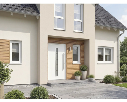 Extérieur d'une maison avec porte d'entrée et fenêtres