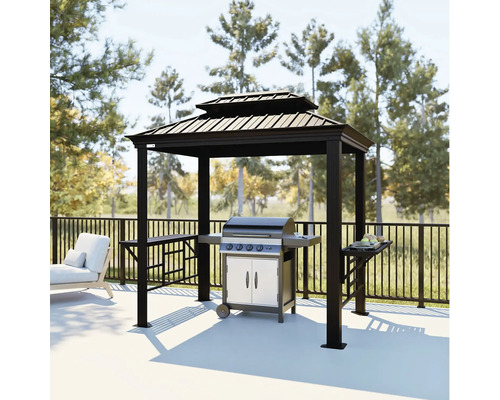 Pavillon de grill avec barbecue et surfaces de rangement sur une terrasse