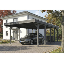 Carport en bois avec voiture et vélo devant une maison