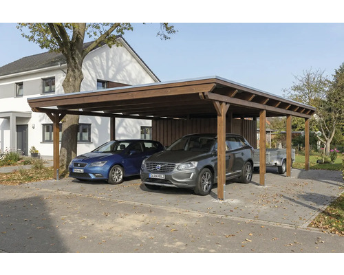 Double carport en bois avec deux voitures et une remorque