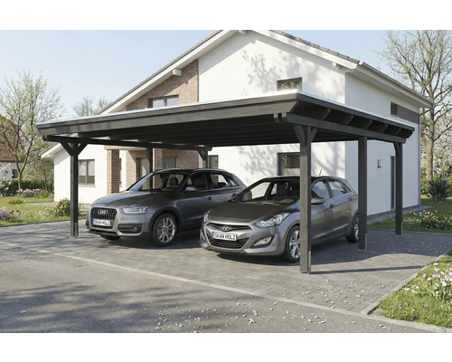Double carport en bois avec deux voitures garées devant une maison.