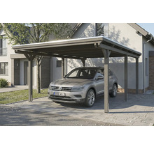 Un abri de voiture en bois avec une voiture en dessous, posée sur une allée pavée.