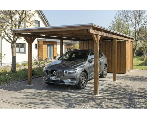 Voiture sous carport en bois avec débarras