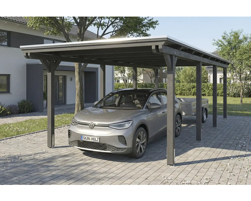 Abri de voiture en bois avec voiture et remorque dans la cour.