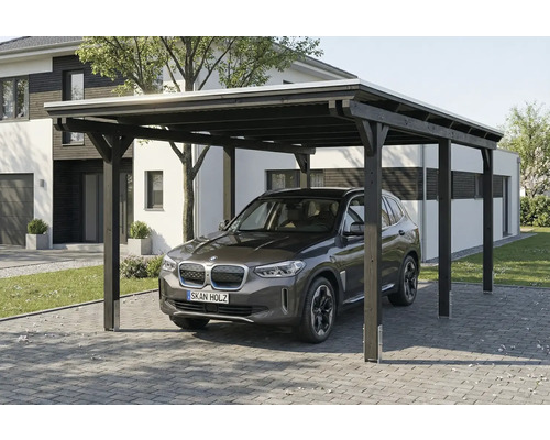Voiture sous un carport en bois