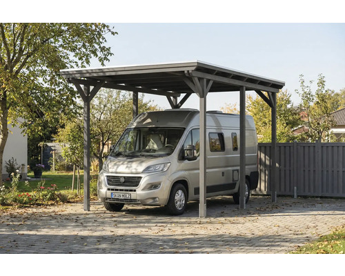Carport en bois avec camping-car dans le jardin
