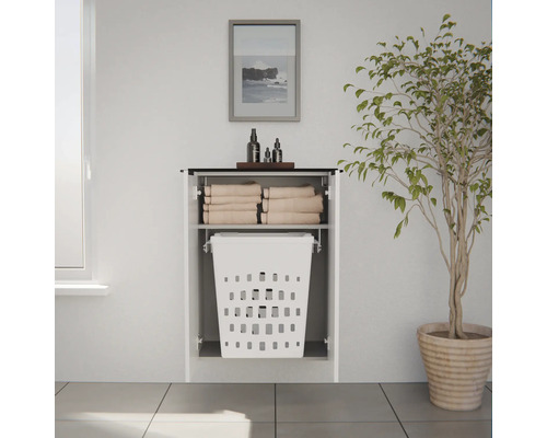 Armoire à linge murale blanche moderne avec compartiment ouvert pour serviettes et panier à linge intégré dans une pièce lumineuse.