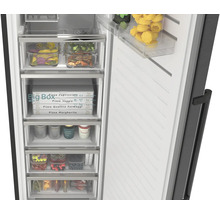 Vue intérieure d'un congélateur ouvert avec tiroir Big Box pour pizzas et compartiments transparents pour aliments organisés.