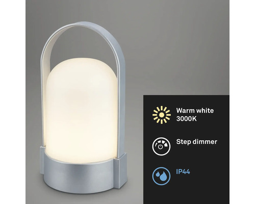 Lampe de table LED portable avec boîtier et poignée argentés, lumière blanc chaud 3000 Kelvin, variateur par paliers et indice de protection IP44.