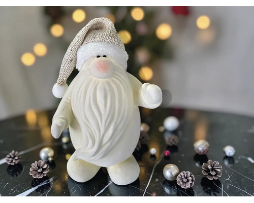Dekorative Weihnachtsmannfigur mit langem weißem Bart und glitzernder Zipfelmütze.