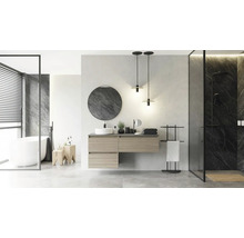 Salle de bain moderne avec meuble en bois, miroir rond, baignoire en îlot et douche italienne avec carrelage effet marbre sombre.