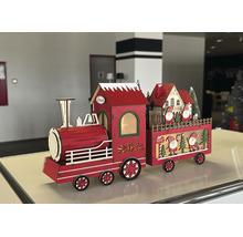 Rote Weihnachtsdekoration Holzzug mit LED-Beleuchtung, bestehend aus Lokomotive und Wagen mit Weihnachtsmann-Figuren und Häusern.