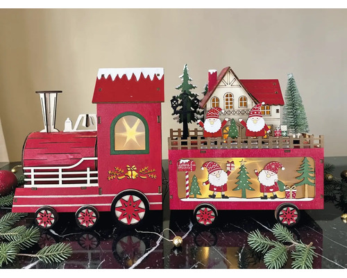 Weihnachtsdekoration Holzzug mit LED-Beleuchtung, bestehend aus Lokomotive und Waggon mit Häusern, Weihnachtsmännern und Tannenbäumen.