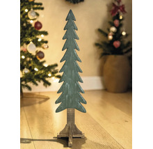 Dekorativer Weihnachtsbaum aus Holz mit Standfuß in einem weihnachtlich dekorierten Raum.